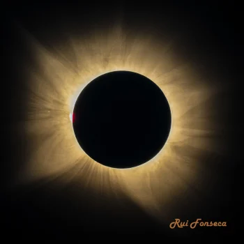 A total solar eclipse with the sun's corona visible.